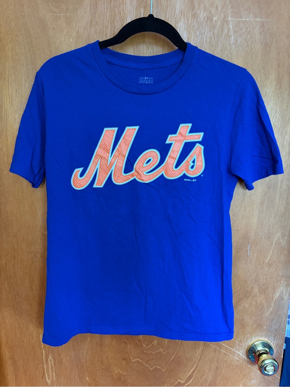 Genuine Merchandise Blue Tee with Orange Mets Script